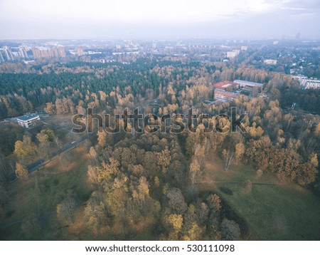 aerial autumn view of urban area in latvia, drone photography - vintage film look
