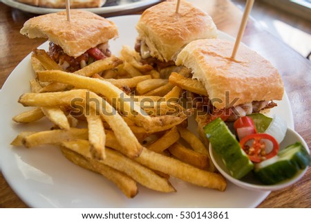 Mini burger with french fries on plate