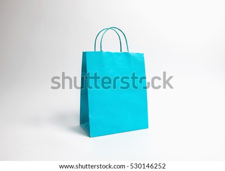 Cyan paper bags isolated on white background
 Royalty-Free Stock Photo #530146252