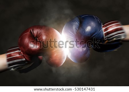 Democrats and Republicans in the campaign symbolized with Boxing Gloves Royalty-Free Stock Photo #530147431