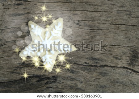Christmas gingerbread cookies on wooden table with copy space , vignetting effect image