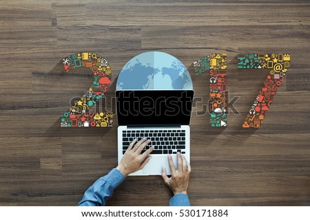 2017 new year business innovation technology set application icons, With businessman working on laptop computer PC, view from above