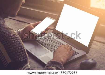 Businessman at work Close-up top view of man working on laptop / soft focus picture / Vintage concep / screen isolated on white