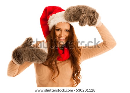 Cute brunette girl in santa dress with presents for christmas