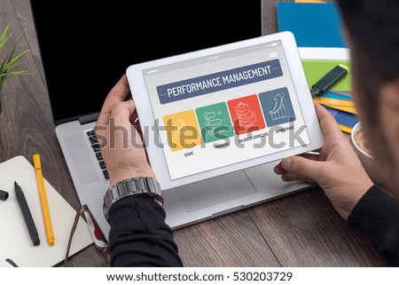 PERFORMANCE MANAGEMENT CONCEPT ON TABLET SCREEN