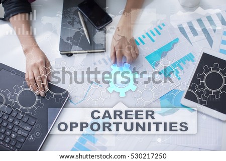 Woman is working with documents, tablet pc and notebook and selecting career opportunities.