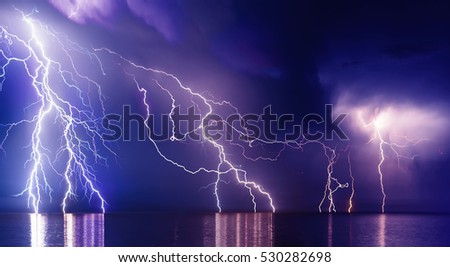 Lightning storm over Black sea near Feodosia Royalty-Free Stock Photo #530282698