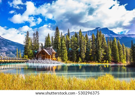 Bridge over Emerald Lake. Camping and coniferous forest. Yoho National Park, Canada Royalty-Free Stock Photo #530296375