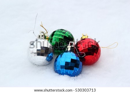 Christmas tree toy's covered with snow
