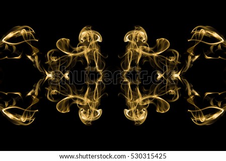 Gold smoke on black background,movement of gold smoke, Abstract gold smoke on black background