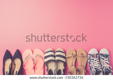 Collection of women's shoes on pink background Royalty-Free Stock Photo #530362726