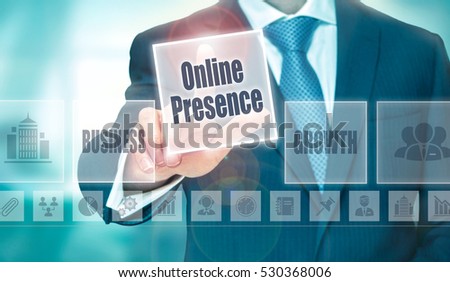 A businessman selecting a Online Presence Concept button on a clear screen.
