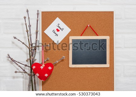 Creative Valentine's Day Card in a Scandinavian with empty space for text, on a white brick wall background, piece of paper with hand written phrase small things. Horizontal Love mock up. Cork board
