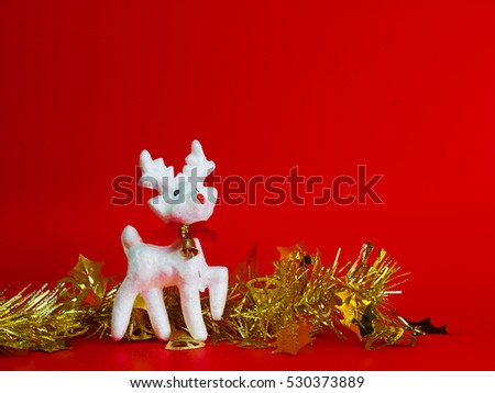 Deer Christmas and decorations ,Red background.