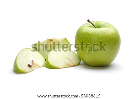 Picture of green uncut apple and apple sliced
