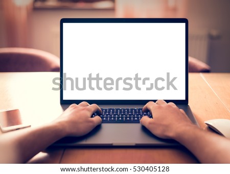 Using laptop with blank screen - POV - Point of view perspective Royalty-Free Stock Photo #530405128