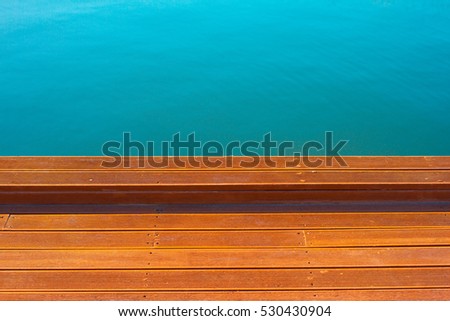 Wood plank on beach background