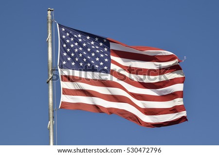Flag of the United States of America flying high.