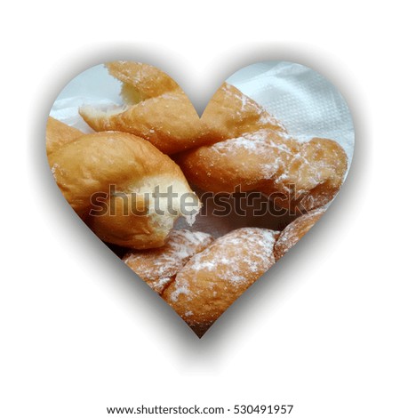 Heart shape with shadow, filled with doughnuts texture