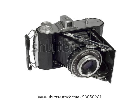 Old foldable vintage camera isolated on white background