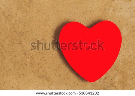 red heart shape on a background of dough.