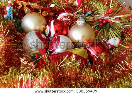 red and golden Christmas balls and tinsel
