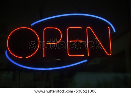 Blue and red neon OPEN Sign. Horizontal.