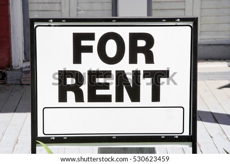 Black and white FOR RENT sign. Horizontal.