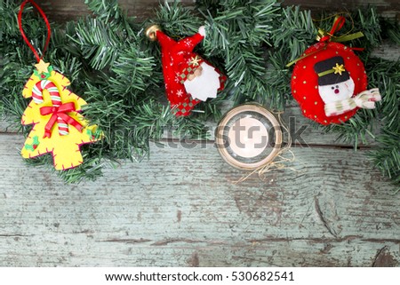 Christmas wooden background with fir tree branches and berries