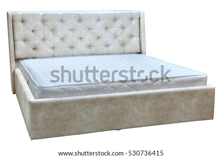 Wooden double bed with cream faux leather, and orthopedic mattresses.