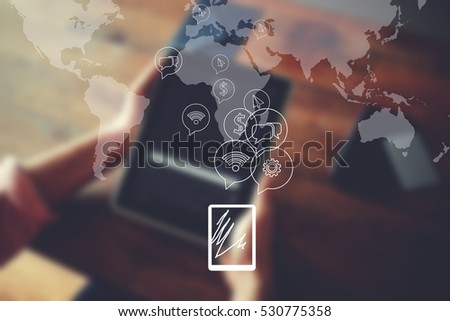 Worldwide map of networking connection in infographic design. Male hands holding digital tablet, business person browsing internet or connecting to wireless via touch pad sitting at wooden table