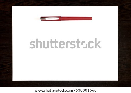 Red pen Isolated on a white paper sheet, template ready for your design