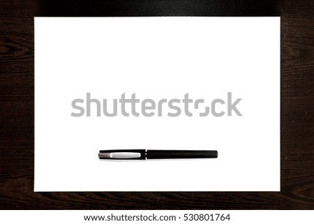 Black pen Isolated on a white paper sheet, template ready for your design