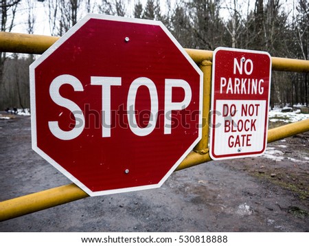 Stop and Do not block gate sign