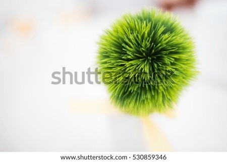 Green flower in round shape