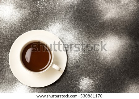 hot tea in a white mug, top view