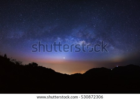 Panorama Milky Way Galaxy at Doi Luang Chiang Dao before sunrise. Long exposure photograph.With grain