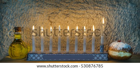 Major traditional Jewish symbols for Hanukkah holiday. Low key image slightly toned for inspiration of retro style and feast ceremony
