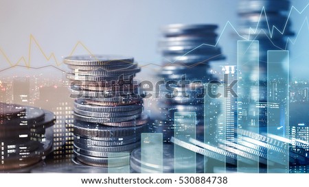 Double exposure of graph and rows of coins for finance and business concept Royalty-Free Stock Photo #530884738