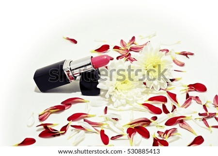 white isolated of red lipstick with flower and petal, symbolizing gift for lady in special occasion or anniversary