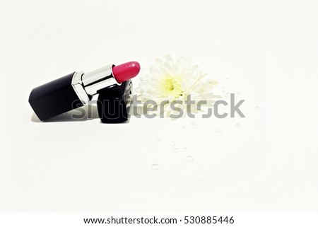 white isolated of red lipstick with wet flower, symbolizing gift for lady in special occasion or anniversary