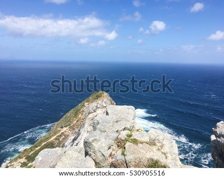 On top of Cape Point (Cape point lighthouse) with navy blue sea and blue sky background, Cape Town, South Africa ,check point 