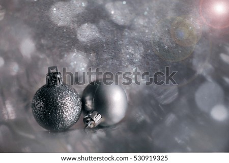 silver Christmas globe and decorations with snowflakes