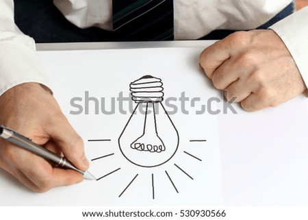 man is finding a new idea on a desk