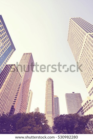 Vintage stylized photo of skyscrapers in Chicago city downtown, USA.