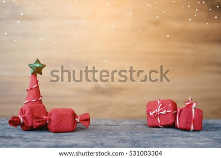 The Little gift on wood. Christmas and new year concept