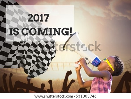 Boy with megaphone against 2017 new year sign in stadium