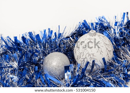  Christmas background with white Christmas balls,and blue tinsel 