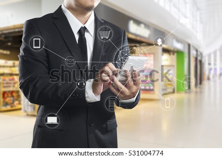 Man using mobile payments online shopping and icon customer network connection on screen, m-banking and omni channel