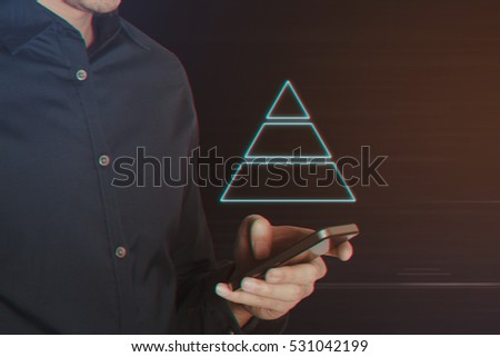 Young Business Man Using Smart phone with Pyramid Chart Icon on Light Motion Background and Lens Flare - Digital 3d Effect Style Color